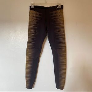 Nike Black and Gold Dri-Fit Leggings Small Glow
